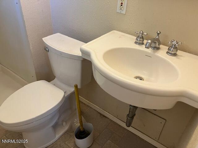 730 James Court Reno, NV 89503 - Photo 15 of 21 a bathroom with a toilet and a sink