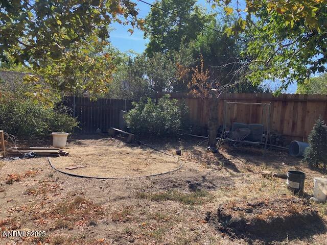730 James Court Reno, NV 89503 - Photo 21 of 21 a view of backyard and wooden fence