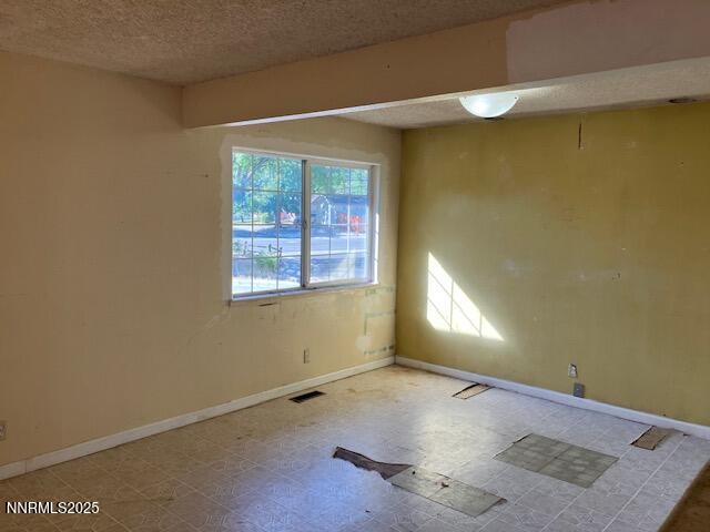 730 James Court Reno, NV 89503 - Photo 7 of 21 an empty room with a empty space and a window