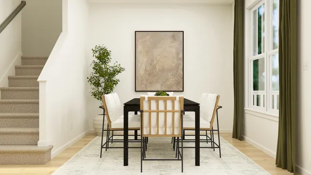 a balcony with table and chairs