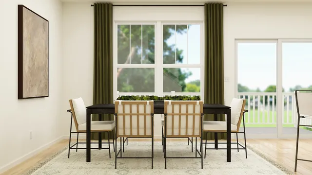 a view of a room with a floor to ceiling window and wooden floor