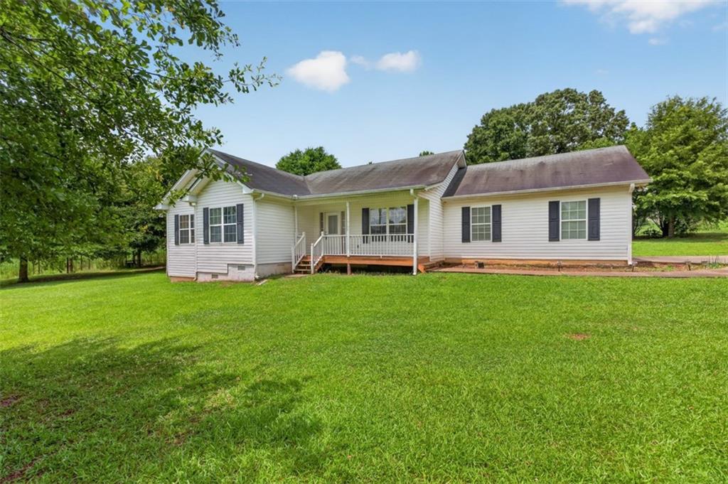 602 Pendergrass Road Winder, GA 30680 - Photo 4 of 44 a view of a house with a backyard