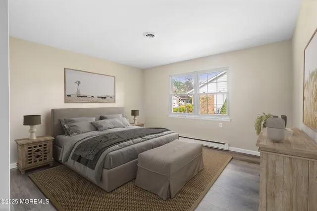a kitchen with granite countertop a refrigerator stove and microwave