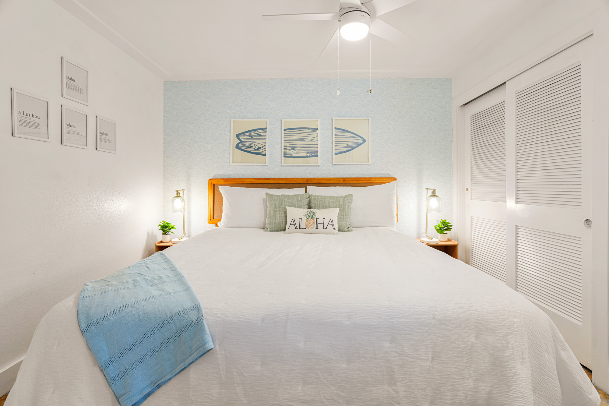 2253 Poipu Road, Unit 309 Koloa, HI 96756 - Photo 16 of 25 a bedroom with a bed and a window