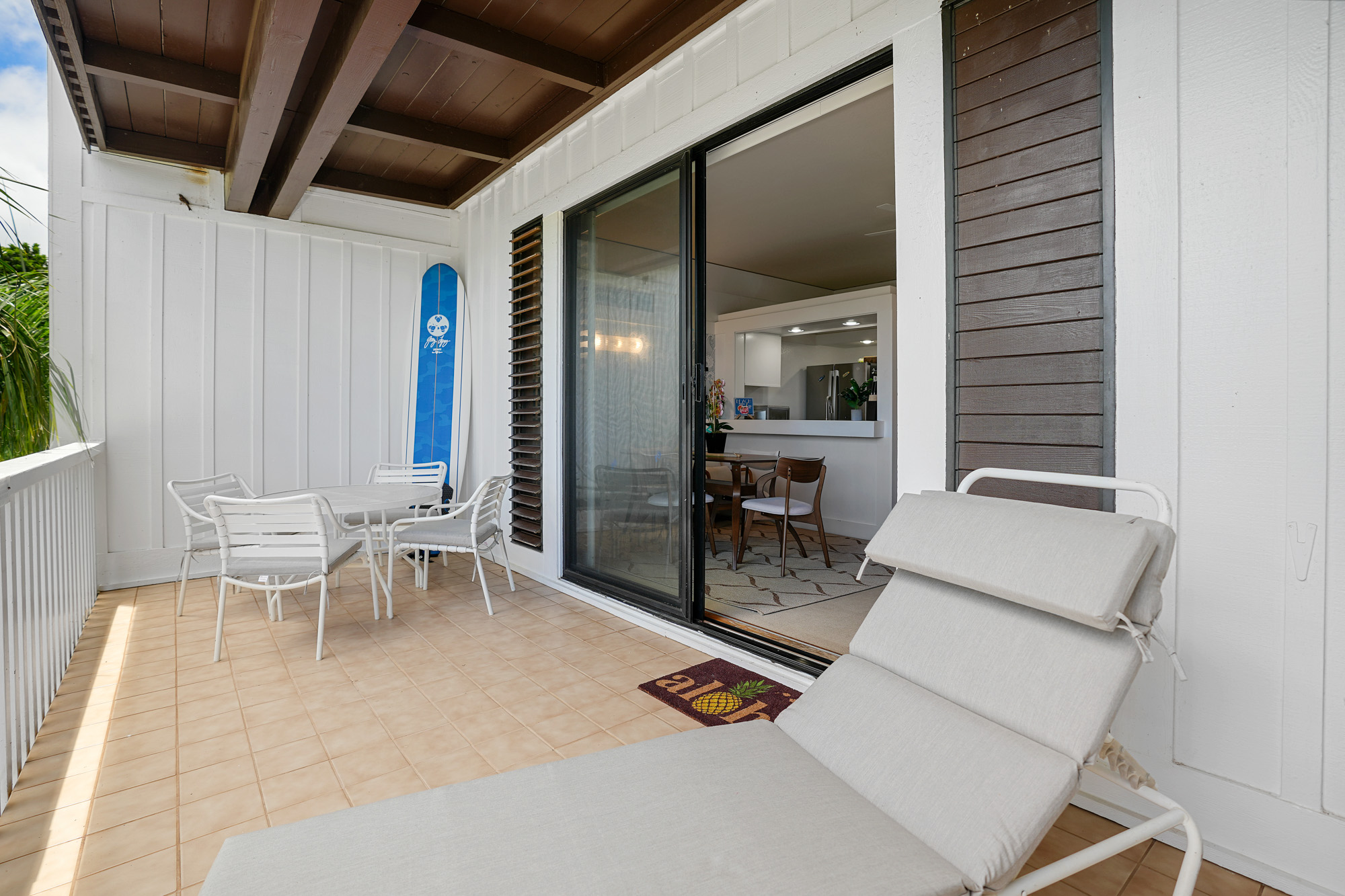 2253 Poipu Road, Unit 309 Koloa, HI 96756 - Photo 23 of 25 a living room with furniture and a table