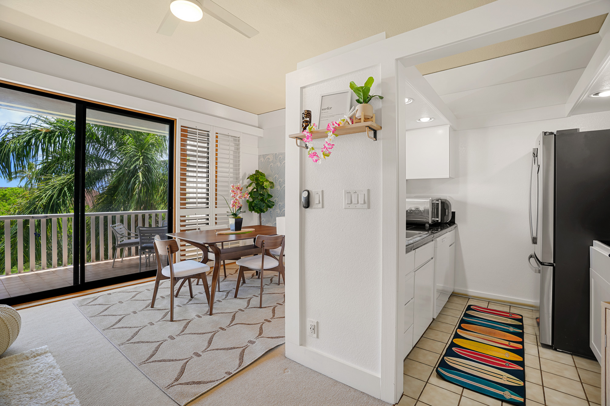 2253 Poipu Road, Unit 309 Koloa, HI 96756 - Photo 8 of 25 a kitchen with furniture and a refrigerator