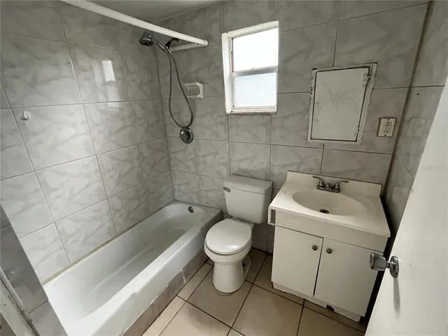 a view of granite countertop white cabinets and a granite counter tops