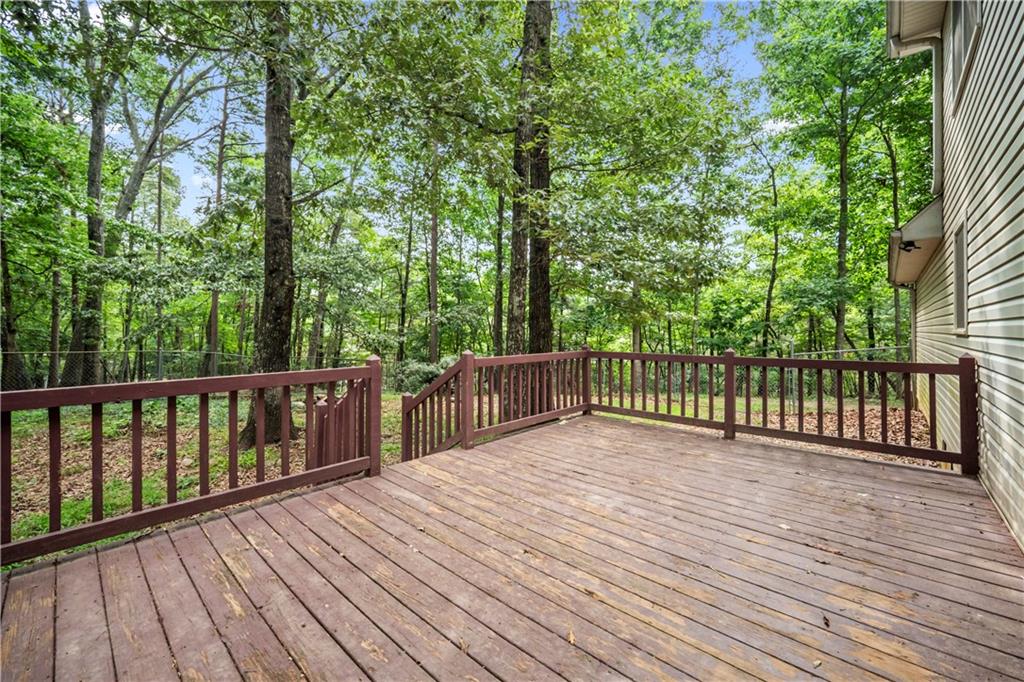 2009 Ben Higgins Road Dahlonega, GA 30533 - Photo 21 of 25 a balcony with wooden floor and fence