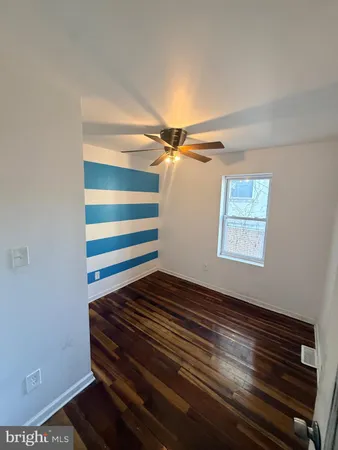 a view of room with window and stairs