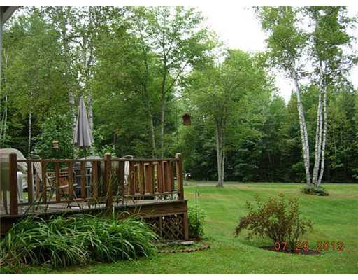 1069 Norway Road Glenburn, ME 04401 - Photo 24 of 25 Yard/Garden. Front yard and Deck view