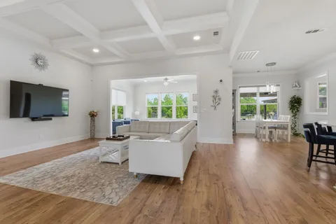 a kitchen with a sink a counter top space and stainless steel appliances