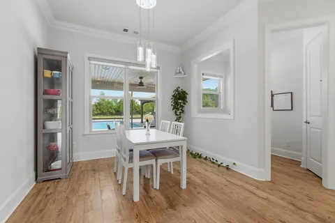a view of kitchen with white cabinets