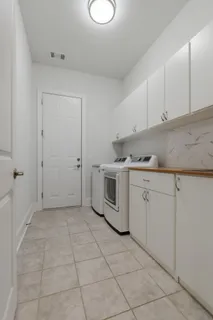 a bathroom with a sink a mirror and a bathtub