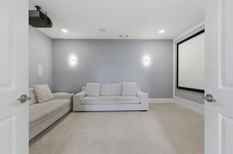 a close view of a mirror and cabinets