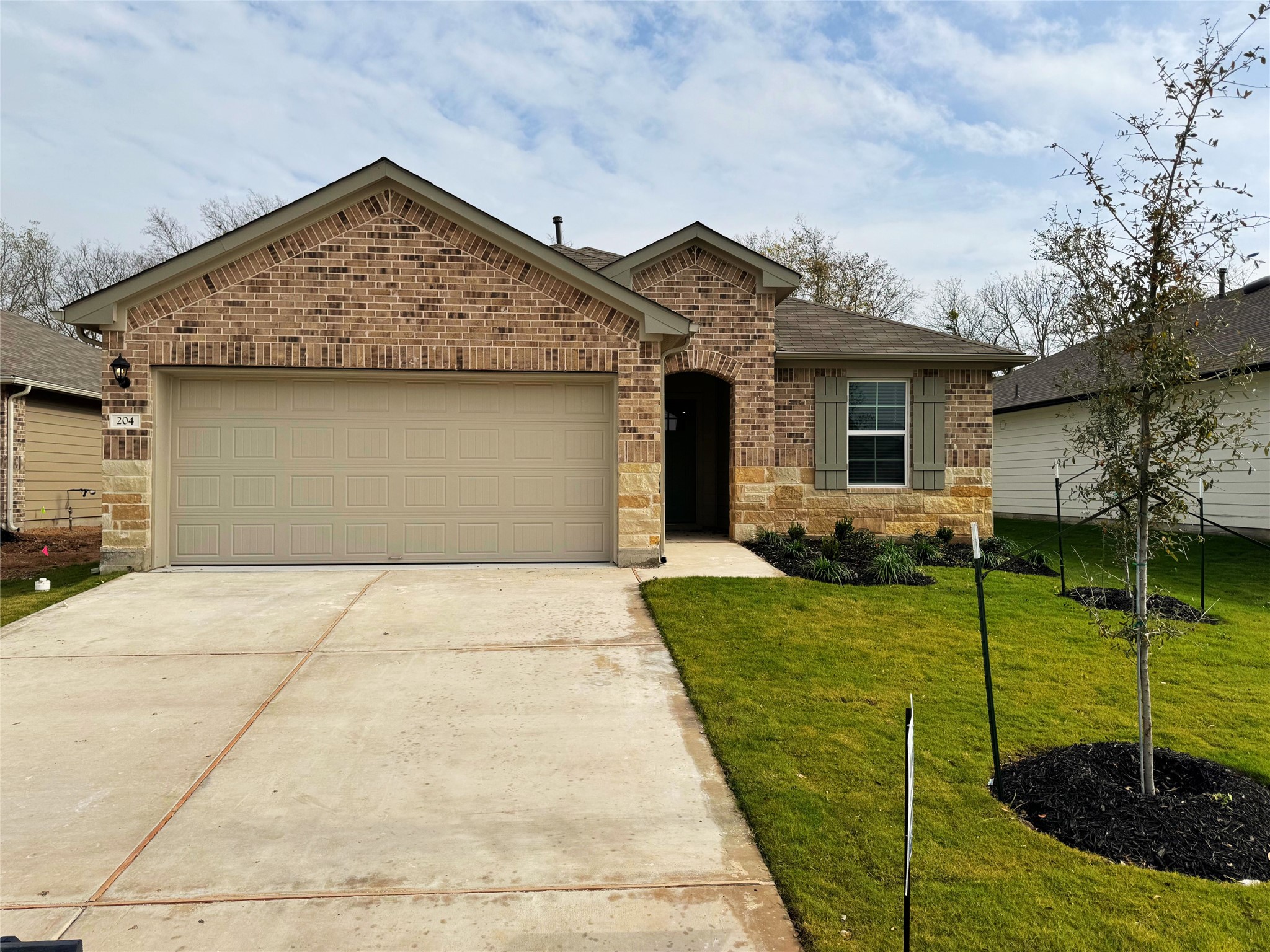 204 Addison Place Lockhart, TX 78644 - Photo 1 of 1 a view of a house with backyard