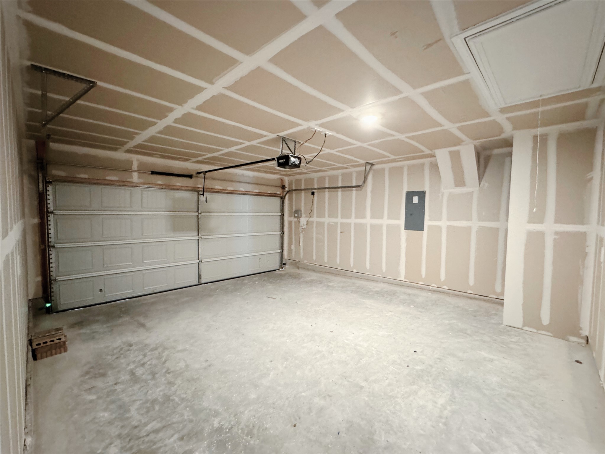 204 Addison Place Lockhart, TX 78644 - Photo 22 of 39 Garage featuring electric panel