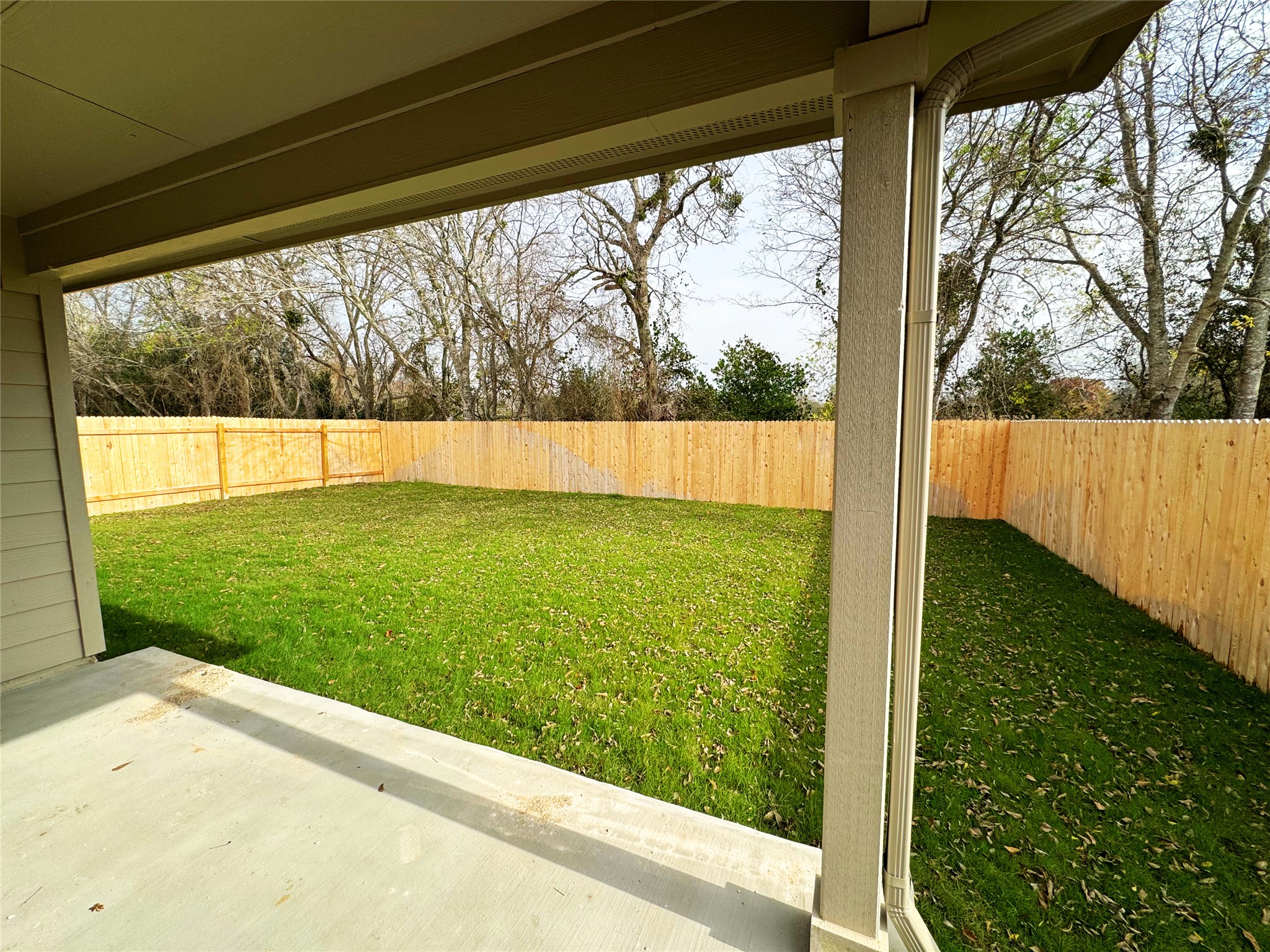 204 Addison Place Lockhart, TX 78644 - Photo 24 of 39 Fenced backyard featuring a patio area