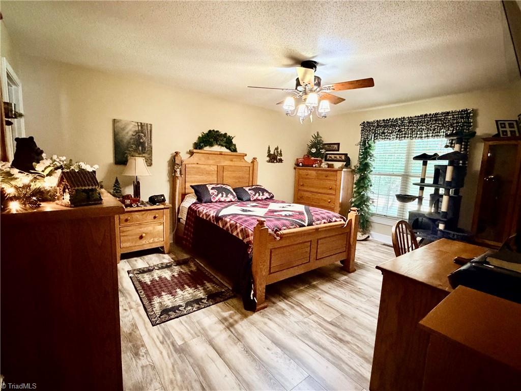 1920 Angell Road Mocksville, NC 27028 - Photo 24 of 30 Primary bedroom with en-suite