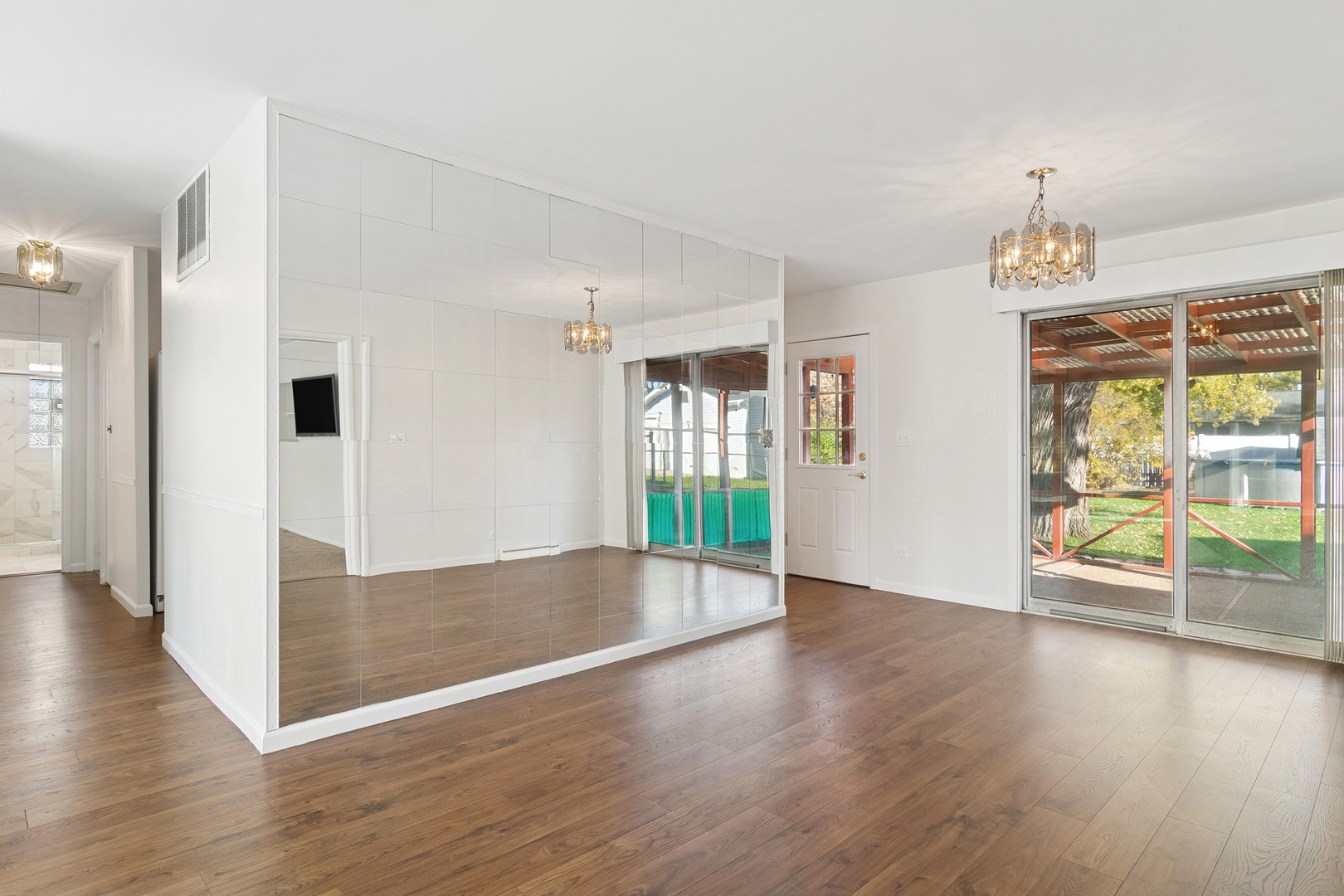 36 Crestview Terrace Buffalo Grove, IL 60089 - Photo 8 of 30 an empty room with wooden floor and windows