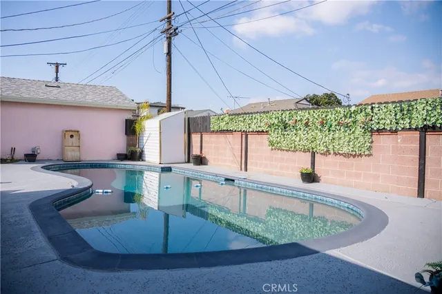 a kitchen with a table and chairs in it