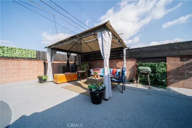 a view of a swimming pool with a patio