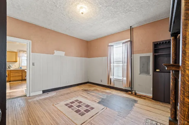 a room with furniture a washer and dryer