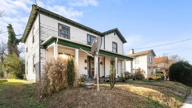 a backyard of a house with garden