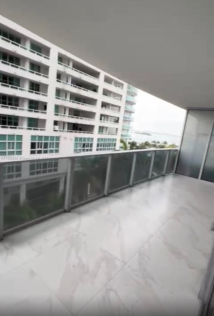 488 Northeast 18th Street, Unit 505 Miami, FL 33132 - Photo 1 of 35 a view of kitchen with a window