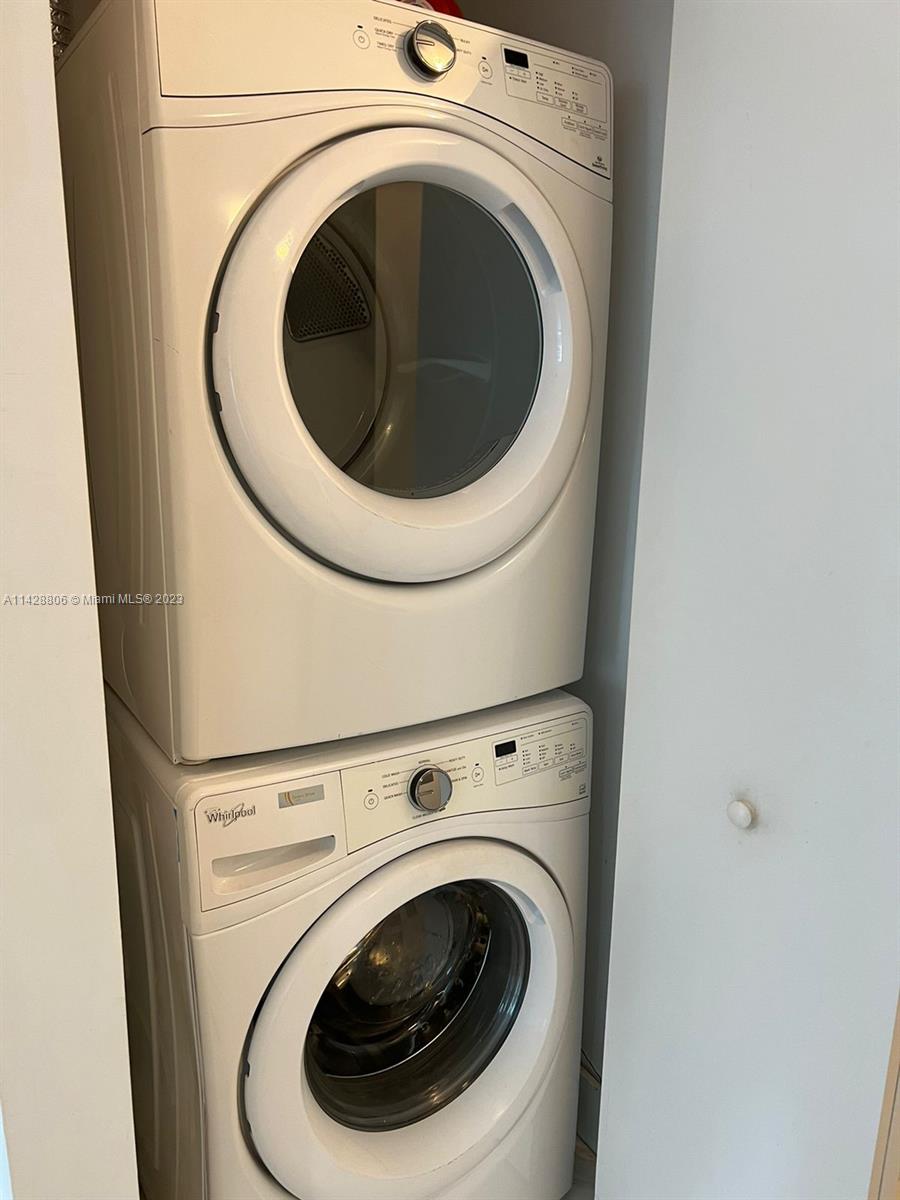 488 Northeast 18th Street, Unit 505 Miami, FL 33132 - Photo 12 of 35 a close up view of a washer and dryer
