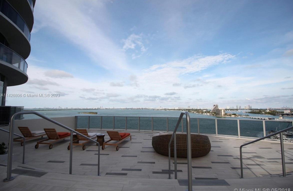 488 Northeast 18th Street, Unit 505 Miami, FL 33132 - Photo 16 of 35 a terrace of a house with outdoor seating