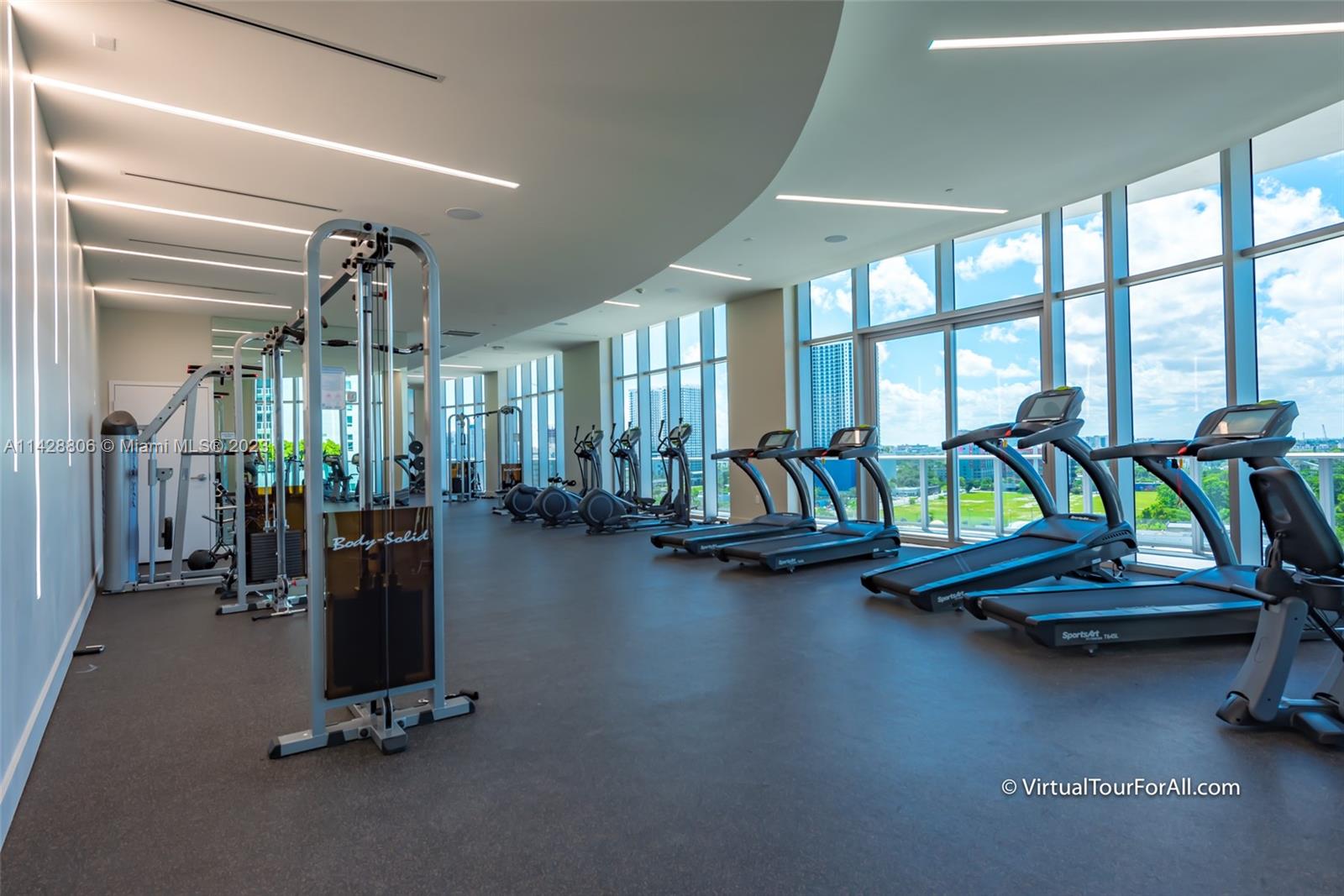 488 Northeast 18th Street, Unit 505 Miami, FL 33132 - Photo 20 of 35 a view of a room with gym equipment