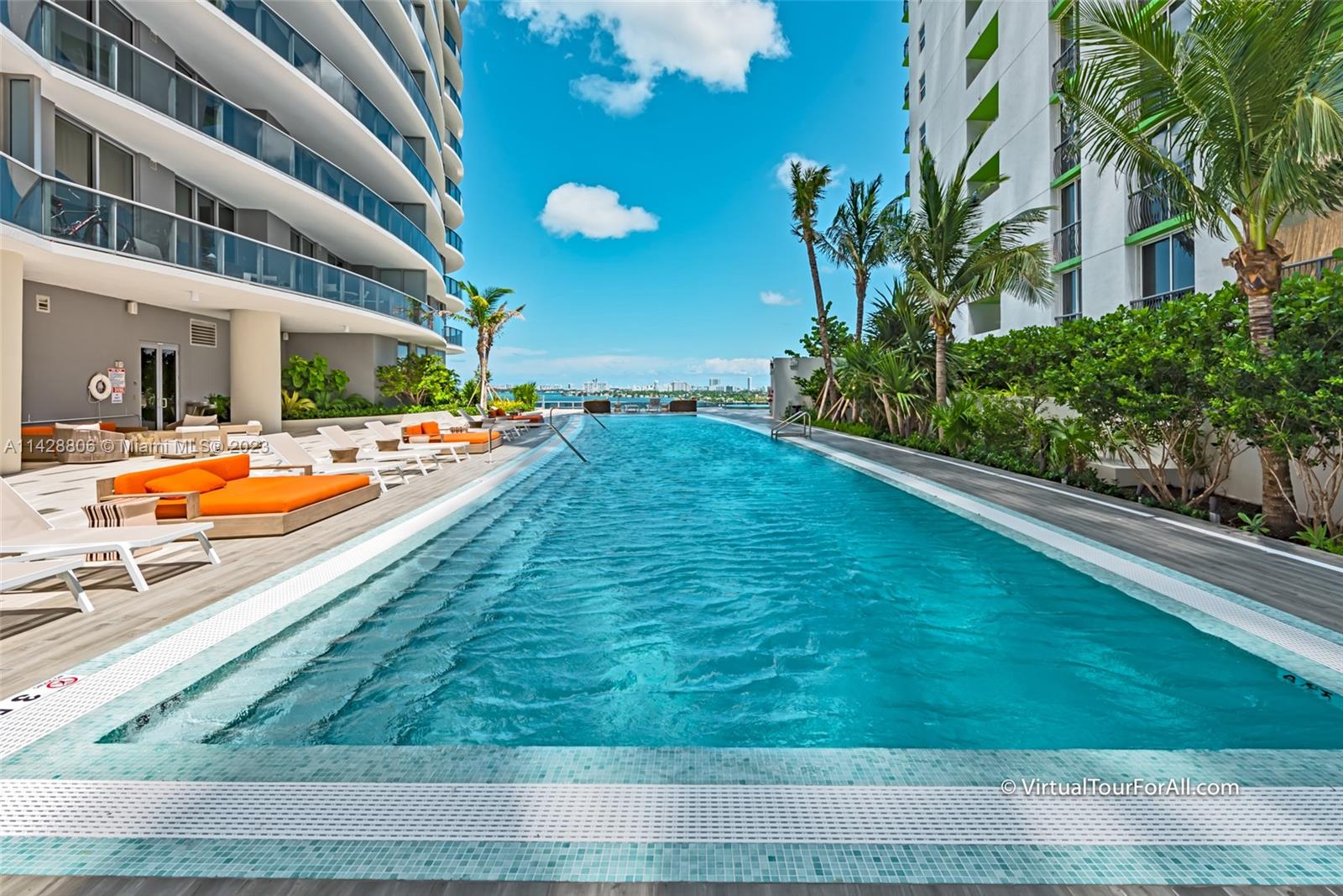 488 Northeast 18th Street, Unit 505 Miami, FL 33132 - Photo 21 of 35 a view of a house with a swimming pool