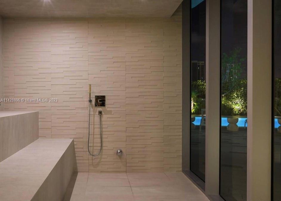 488 Northeast 18th Street, Unit 505 Miami, FL 33132 - Photo 34 of 35 a bathroom with a shower