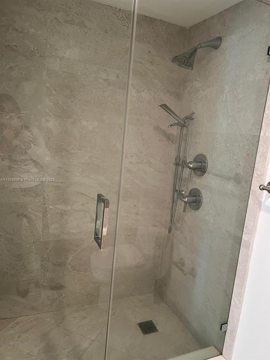 488 Northeast 18th Street, Unit 505 Miami, FL 33132 - Photo 7 of 35 a bathroom with a shower