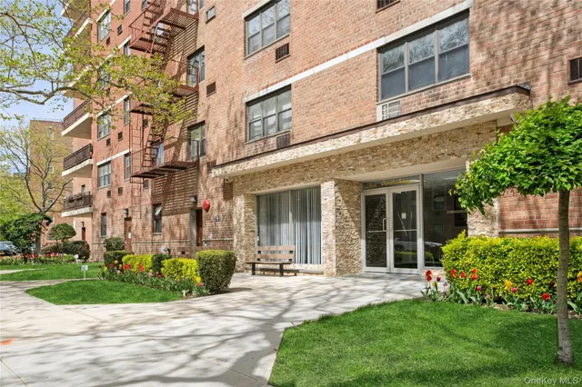 a view of a living room and chandelier