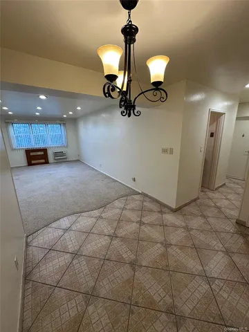 a view of a room with a hanging cabinets