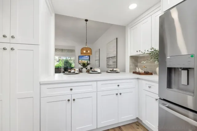 a bedroom with bed and a window