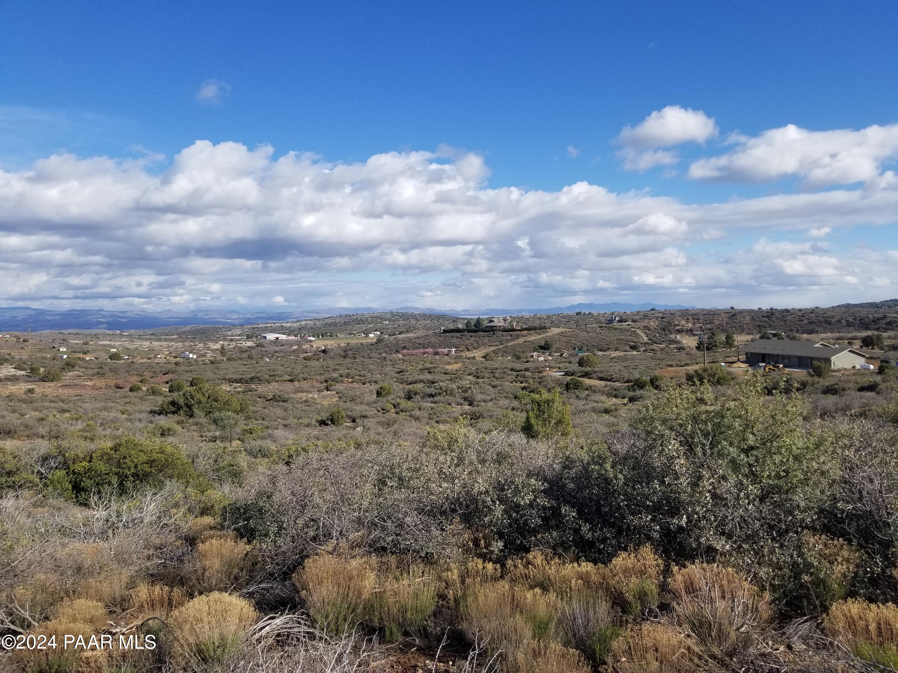 11425 South Hackberry Road Mayer, AZ 86333 - Photo 17 of 20 a view of a bunch of trees in a field