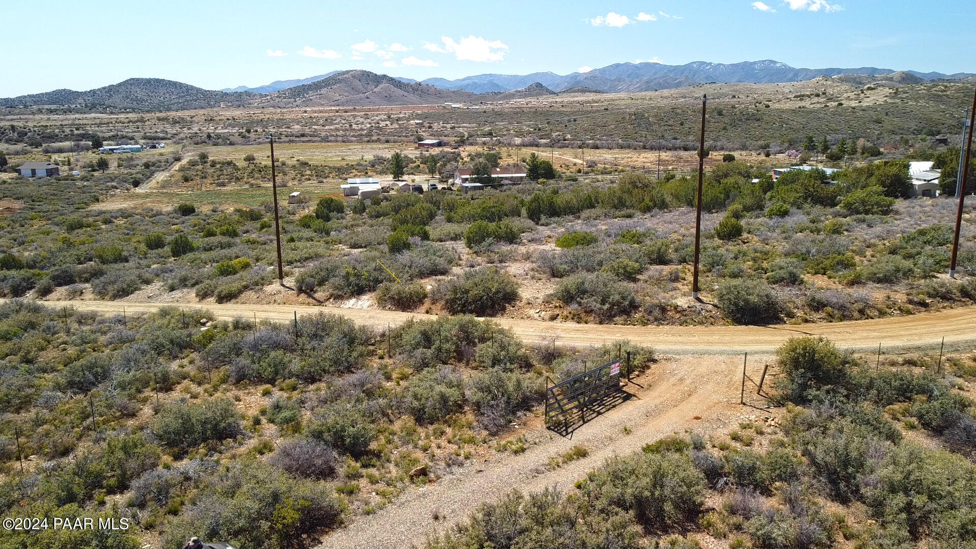 11425 South Hackberry Road Mayer, AZ 86333 - Photo 2 of 20 a view of a town with mountains in the background