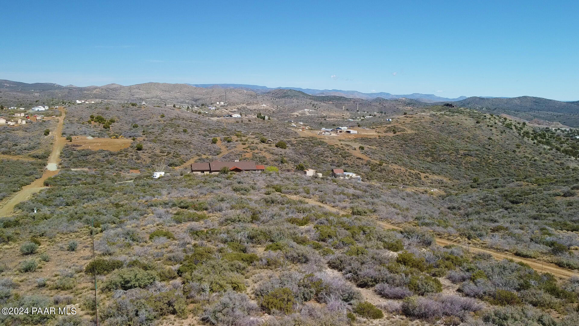 11425 South Hackberry Road Mayer, AZ 86333 - Photo 9 of 20 an aerial view of houses covered in trees