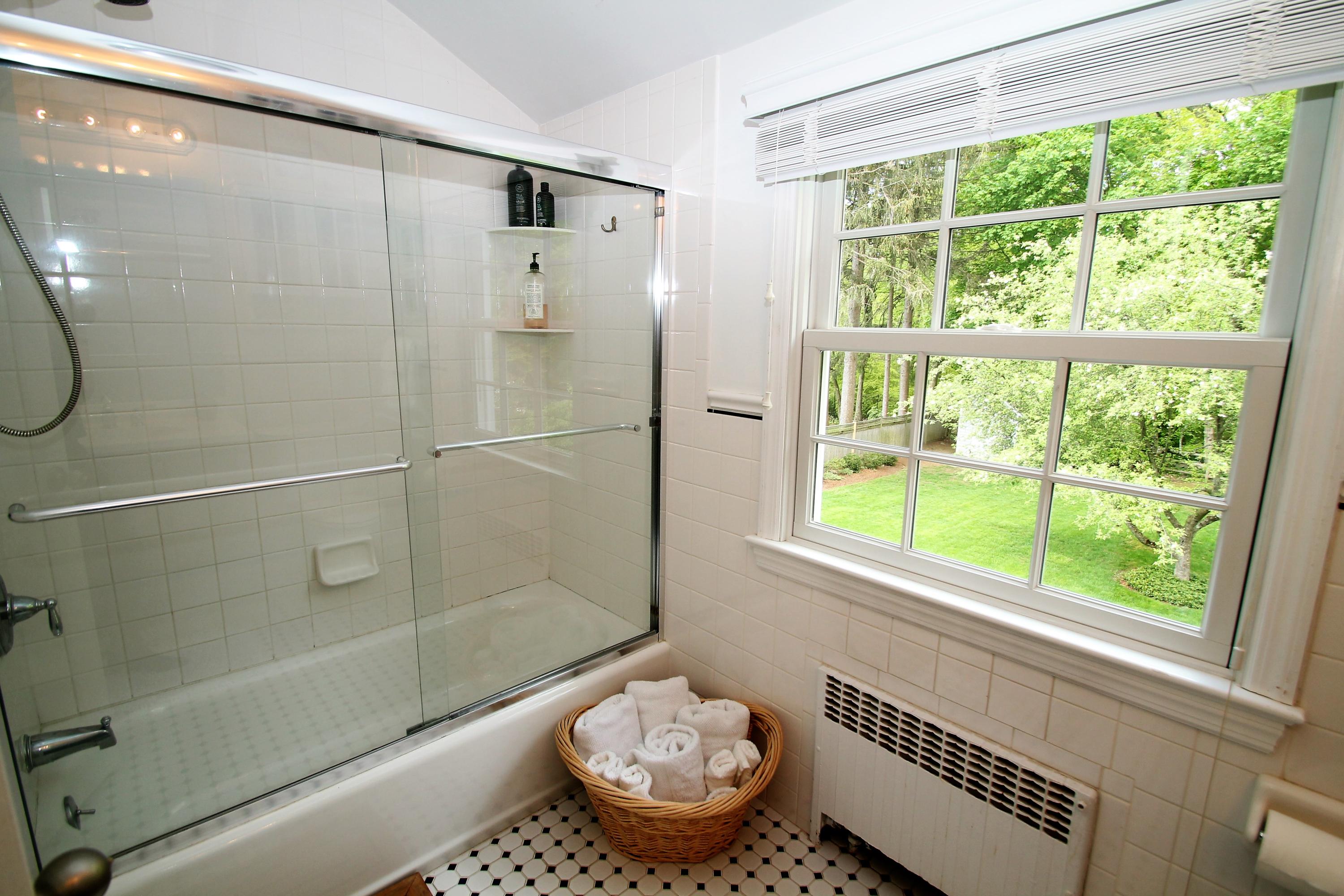 23 Birch Road Darien, CT 06820 - Photo 16 of 17 a bathroom with a sink and a shower