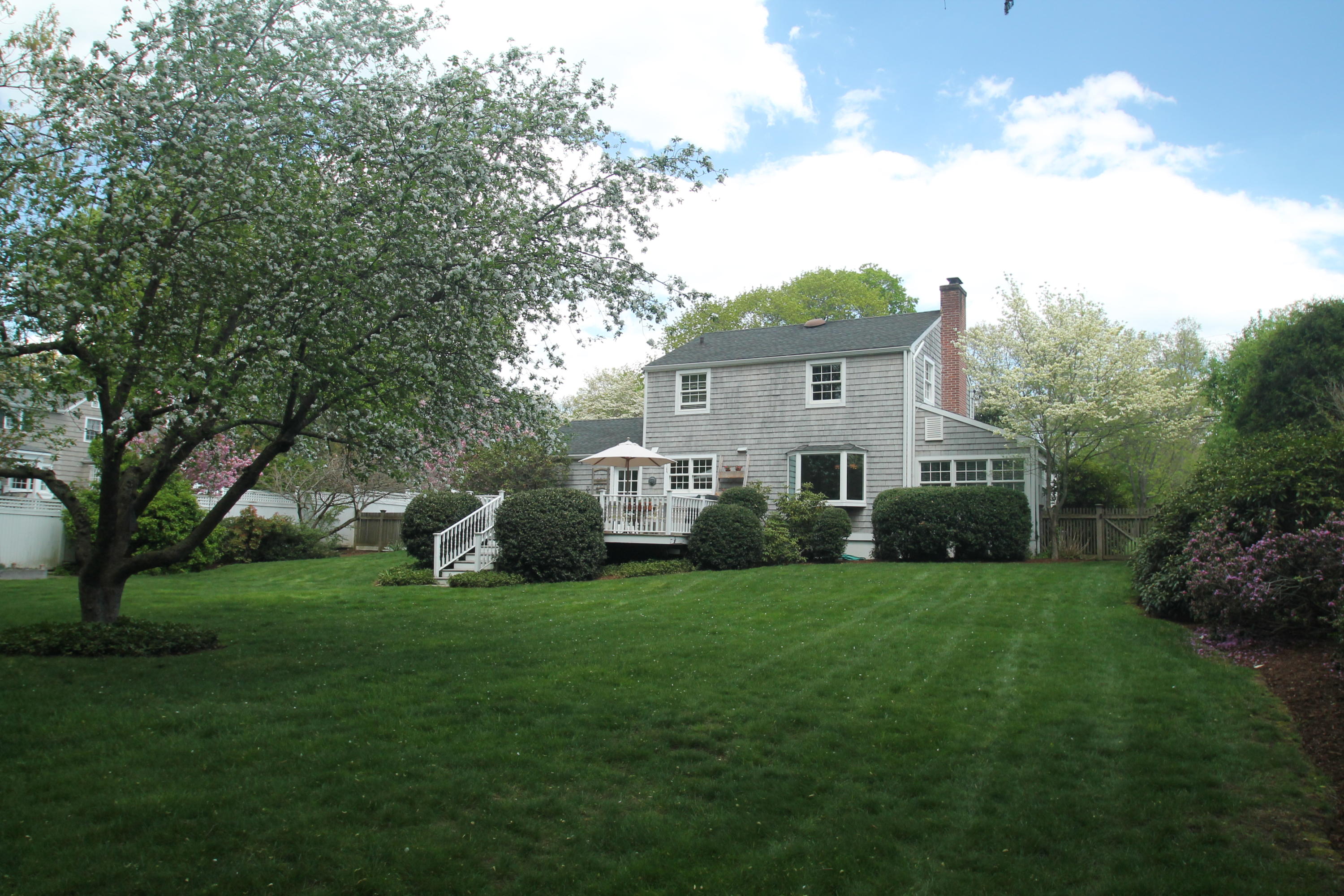 23 Birch Road Darien, CT 06820 - Photo 4 of 17 a view of a house with a big yard