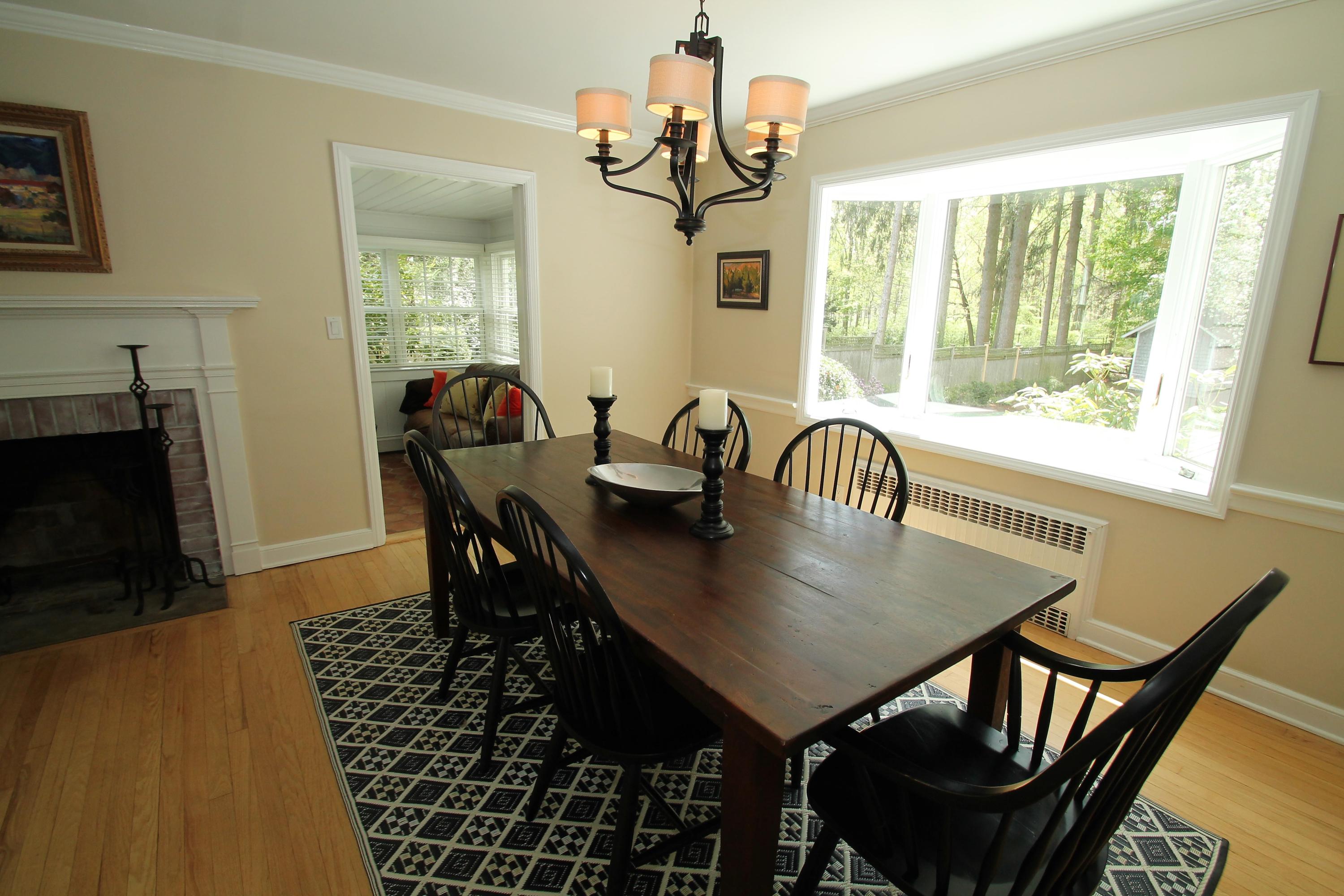23 Birch Road Darien, CT 06820 - Photo 8 of 17 a view of a dining room with furniture window and outside view