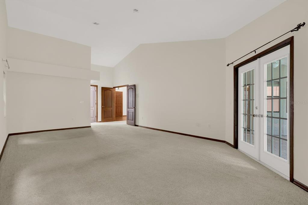 642 Erin Way Brooksville, FL 34601 - Photo 15 of 45 a view of an empty room with a window