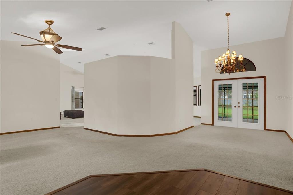 642 Erin Way Brooksville, FL 34601 - Photo 27 of 45 a view of a livingroom with a chandelier