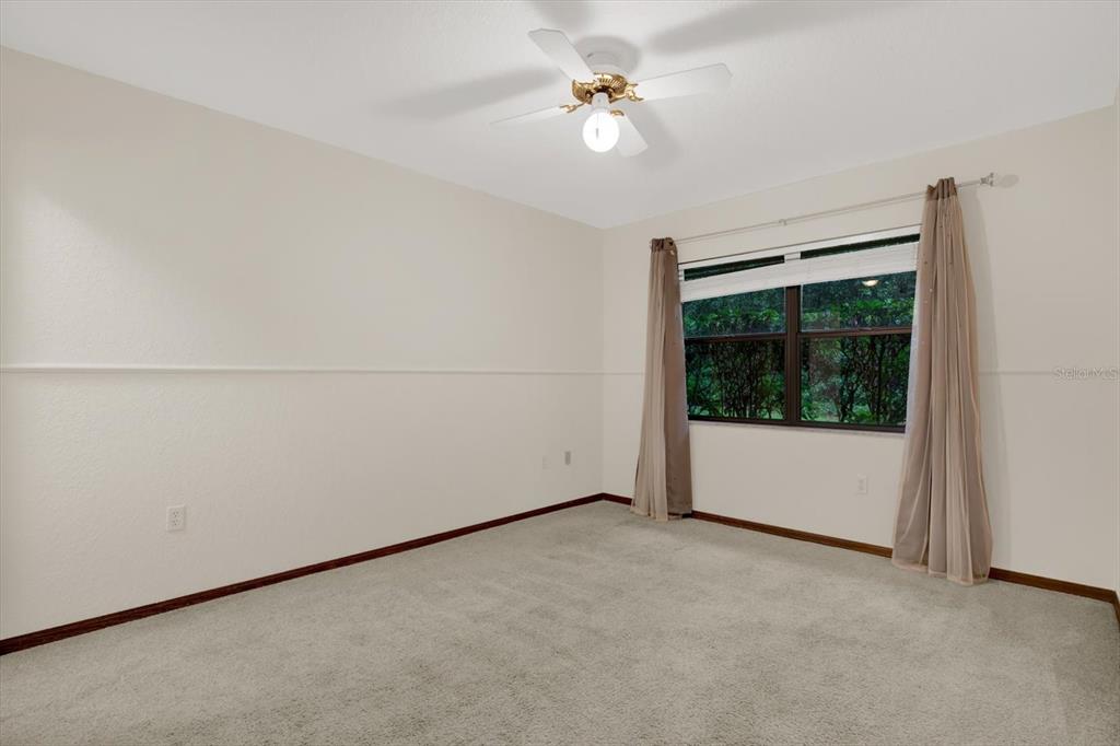 642 Erin Way Brooksville, FL 34601 - Photo 32 of 45 an empty room with a window