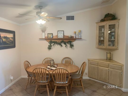 600 South Erin Street Ridgecrest, CA 93555 - Photo 13 of 39 a dining room with furniture and chandelier