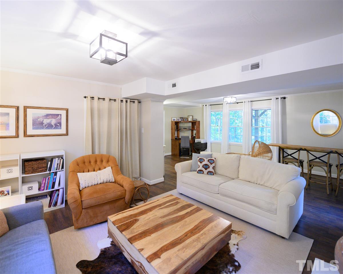 4917 Oak Park Road Raleigh, NC 27612 - Photo 15 of 25 a living room with furniture