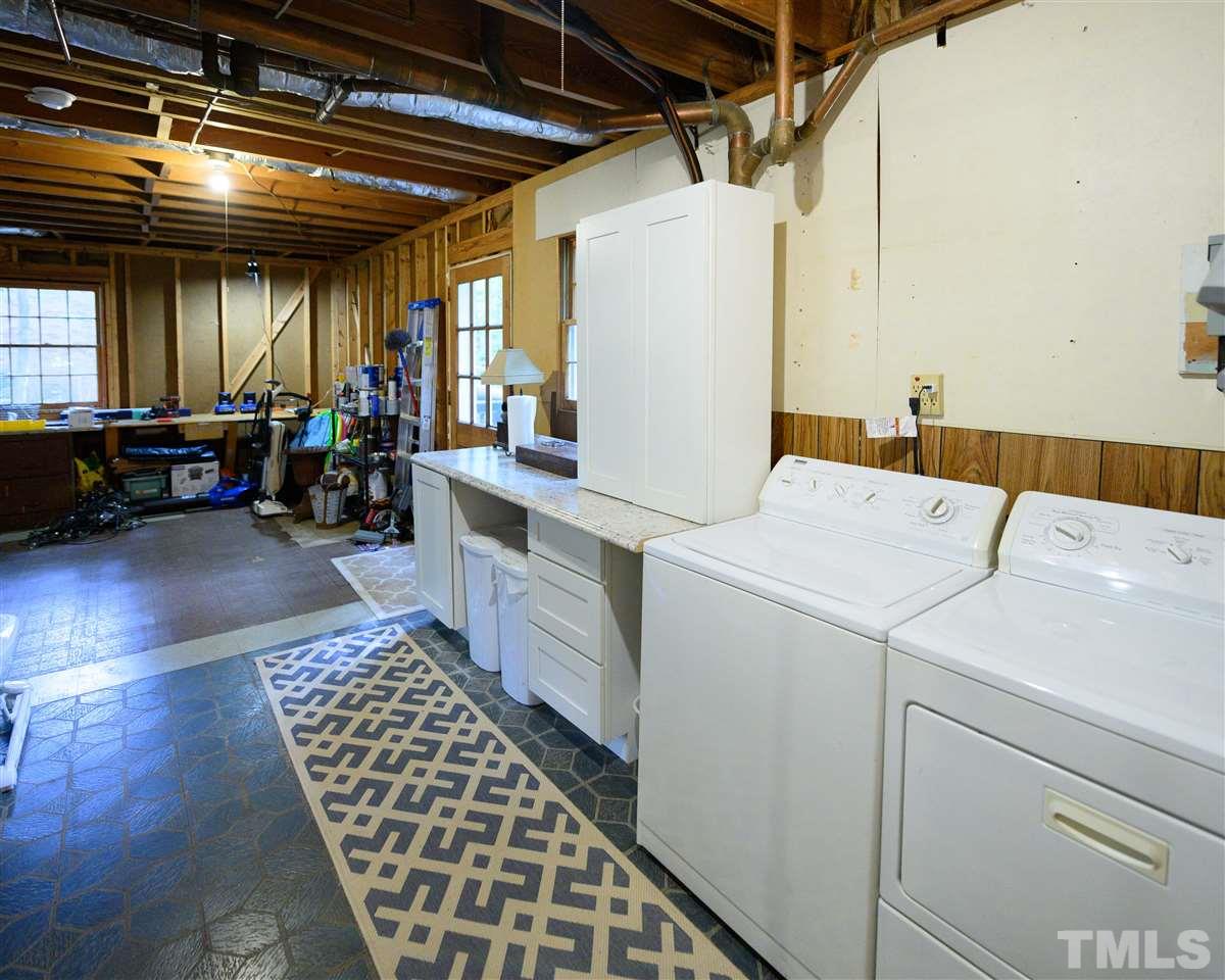 4917 Oak Park Road Raleigh, NC 27612 - Photo 18 of 25 a utility room with dryer and washer