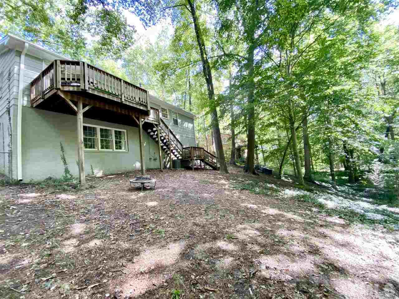 4917 Oak Park Road Raleigh, NC 27612 - Photo 21 of 25 a view of a house with a yard